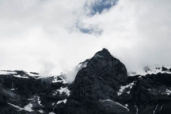 cloud over peaks of mountains